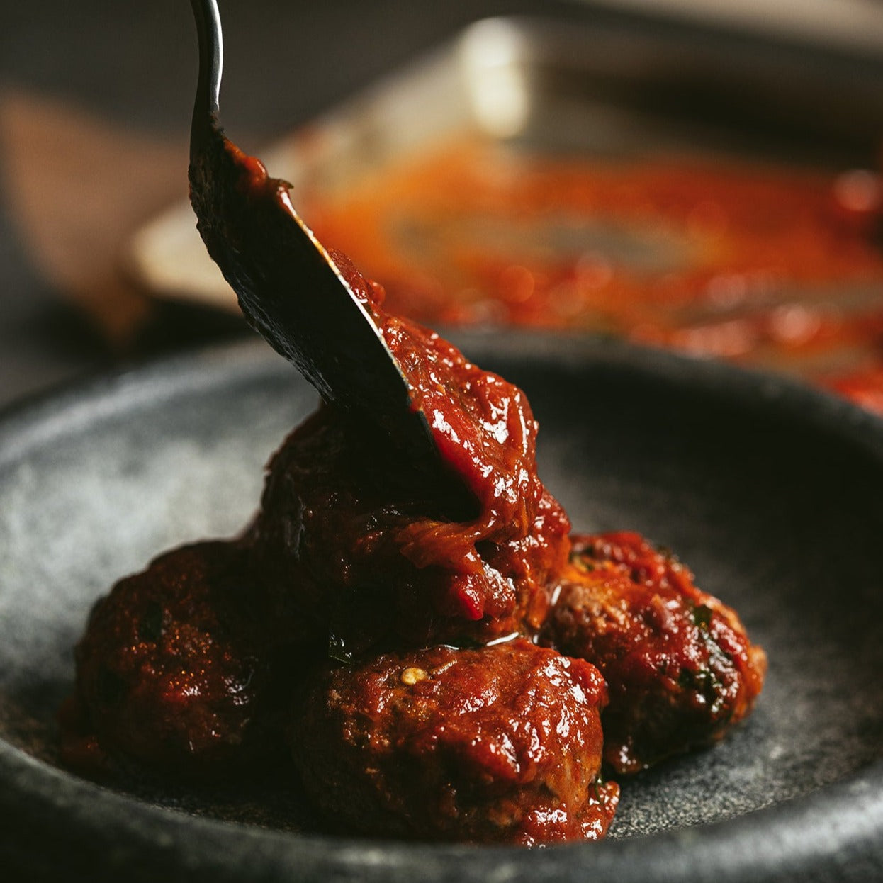 Meatballs in tomato sauce with mozarella